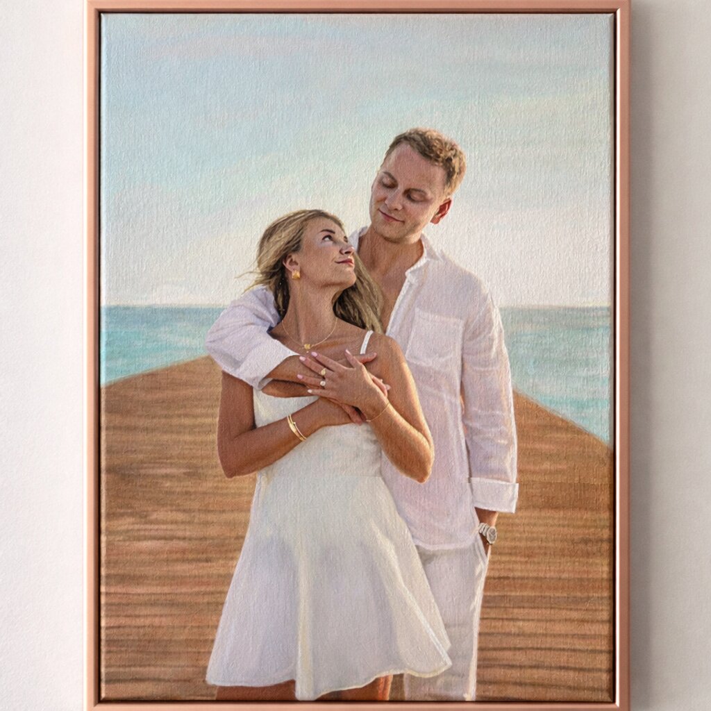 Framed oil painting of a couple embracing on a wooden pier by the ocean.